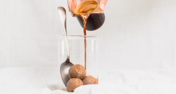 Espresso pouring over keto ice cream