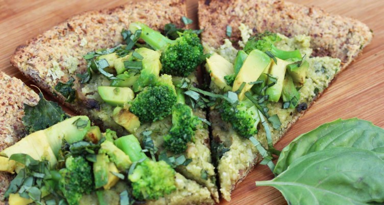 pizza with avocado, broccoli, and kale