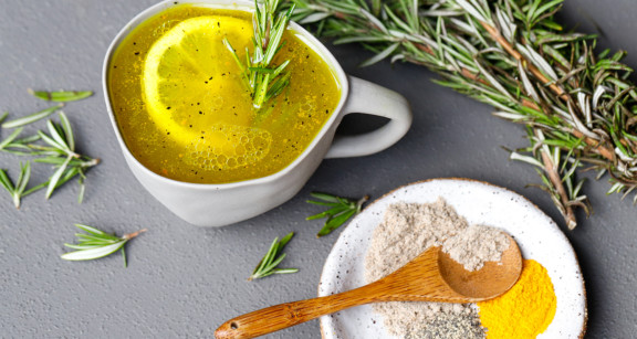 Mug of bone marrow broth with lemon slice