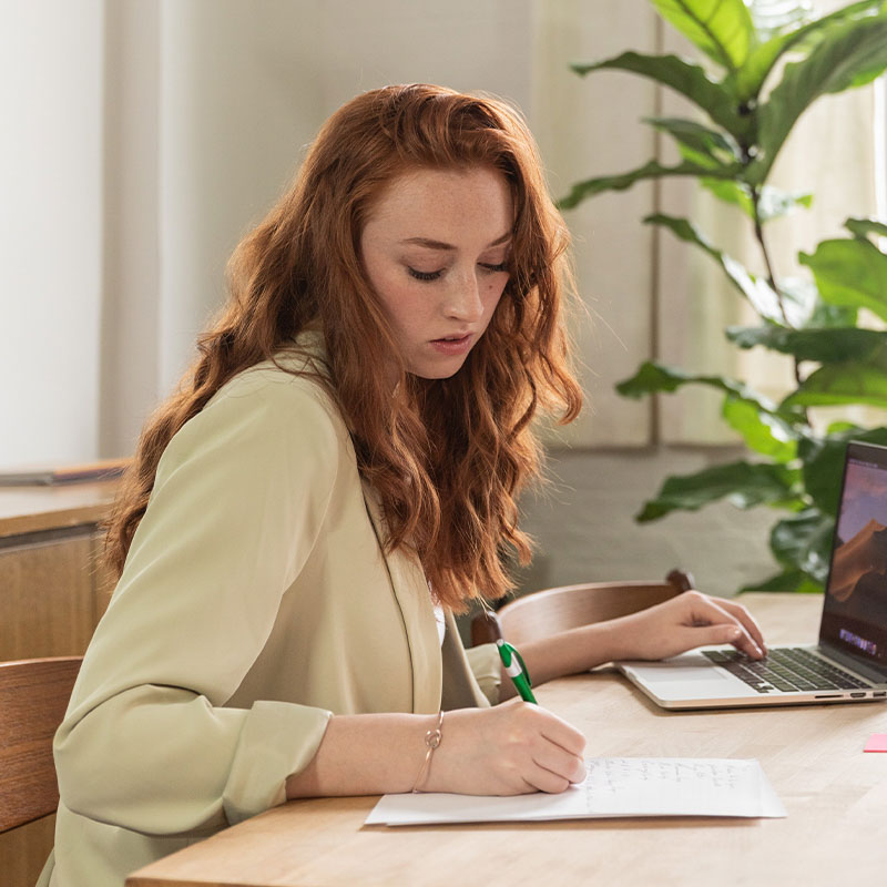 writer working on a laptop