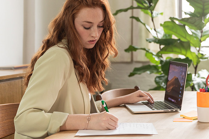 writer working on a laptop