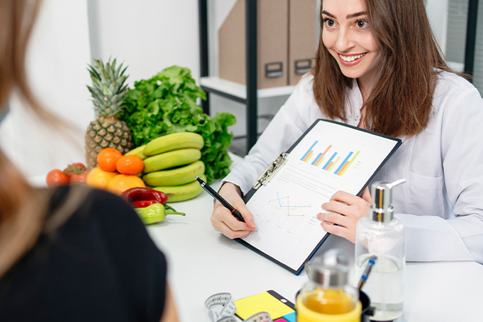 nutritionist working with a client